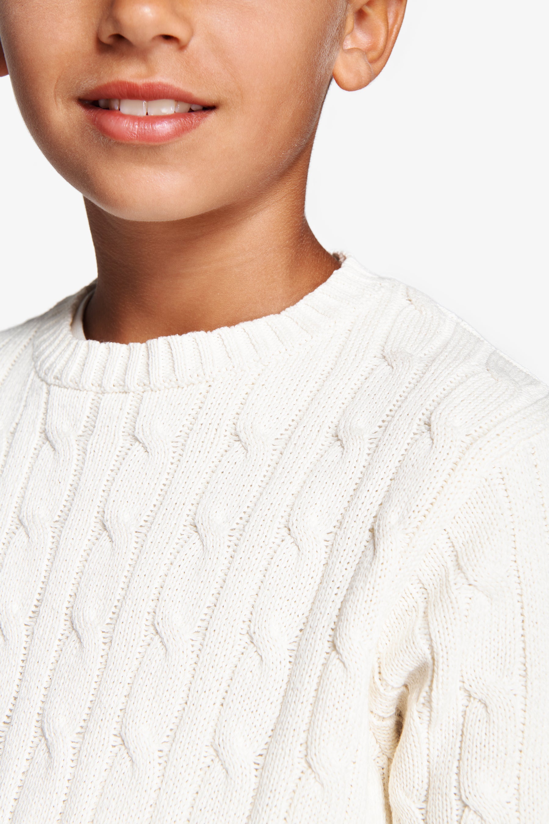 Suéter de cuello redondo trenzado color crema para niños
