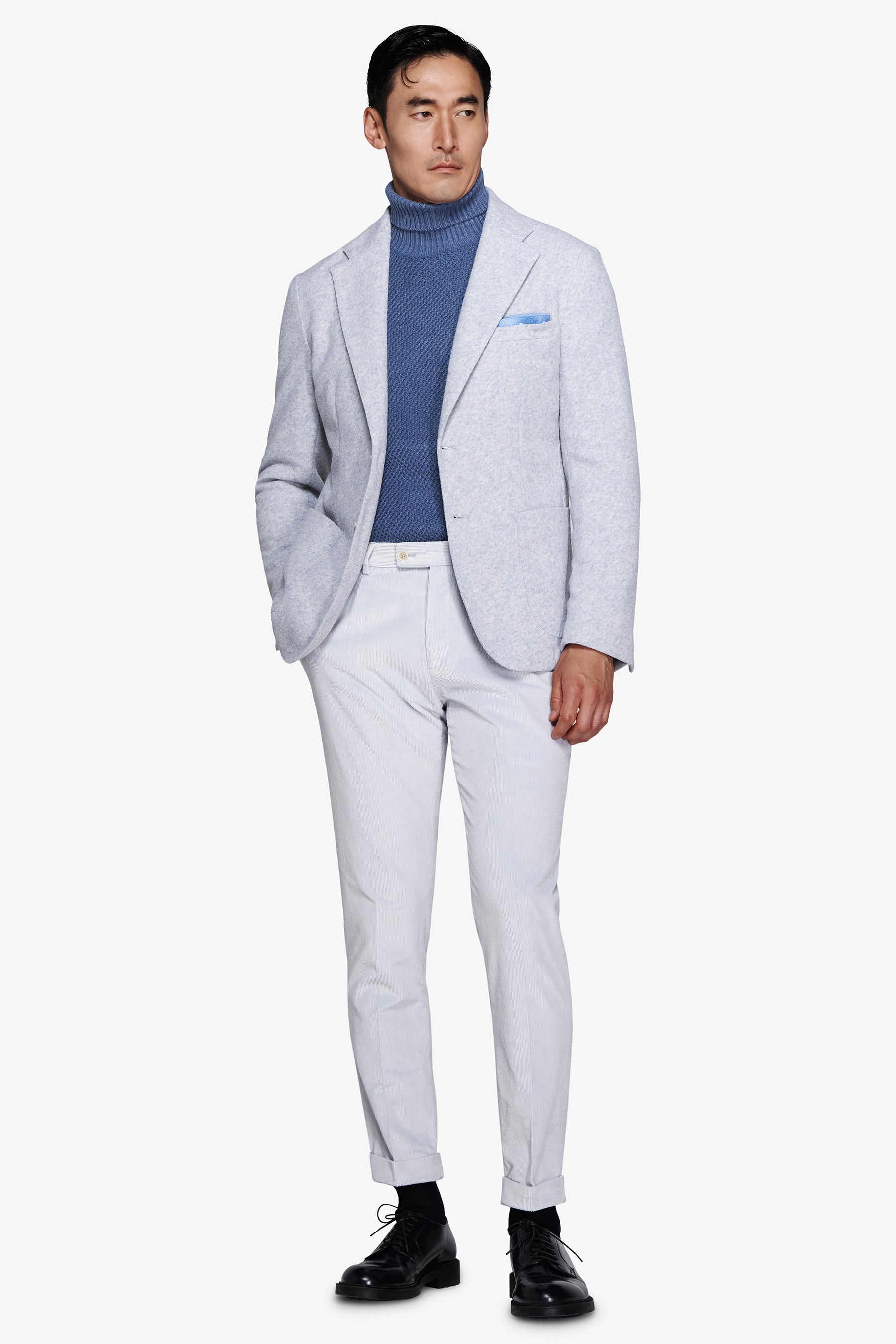 Americana de punto jersey jaspeado celeste